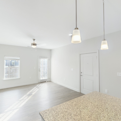 Kitchen with view of living room