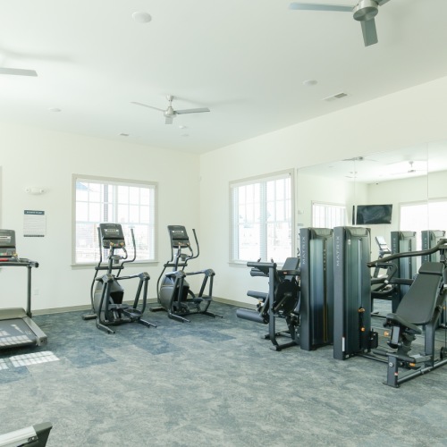 Fitness center, weights and mirror